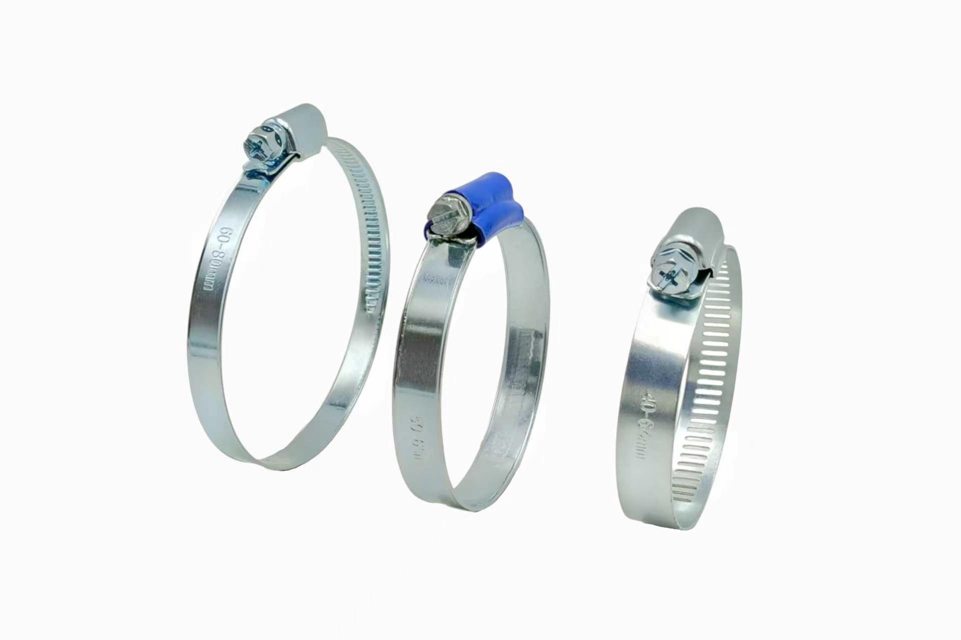 Close-up comparison of American, German, and British style hose clamps