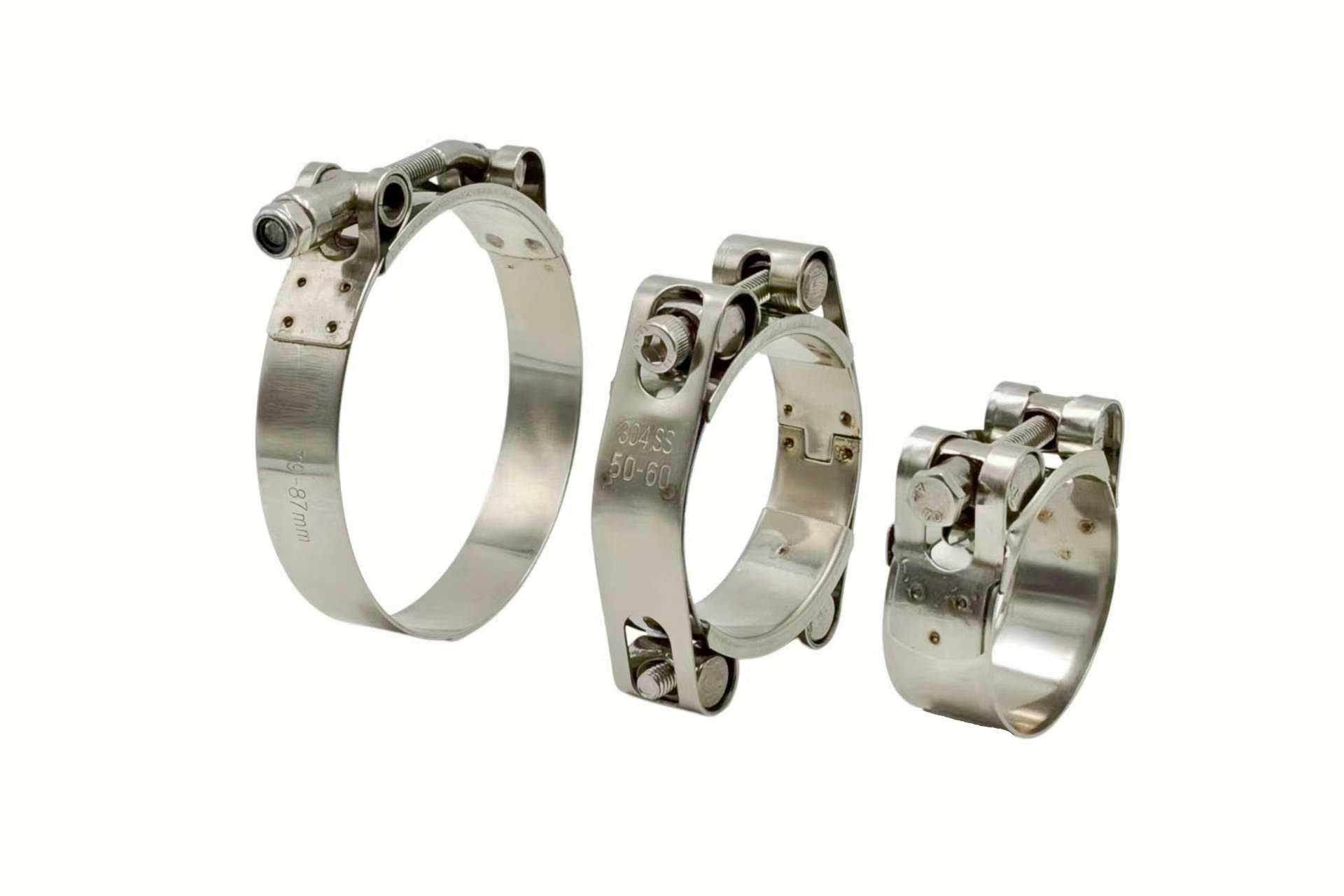 A heavy-duty T-bolt clamp on a large industrial hose